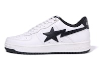 a white and black sneaker with a star on it